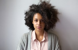 Close up portrait of a beautiful young woman with afro hairstyle