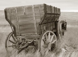 antique wood wagon in sepia tones