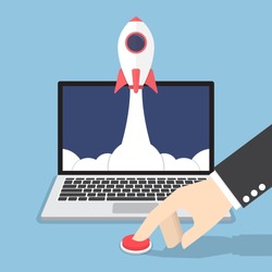 Businessman hand pushing the button to launch rocket from laptop monitor, startup business concept
