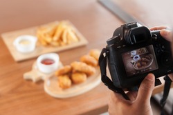 DSLR camera take a photo food at cafe
