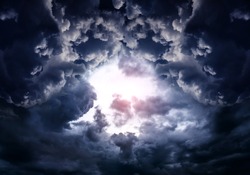 Hole in the Dark and Dramatic Storm Clouds