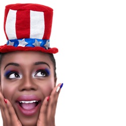 Patriotic excited African American black woman wearing red white and blue nail polish girl make up and hat for July 4th or 4, Memorial, President, labor day, vote, Independence or sale with copy space
