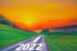 Open empty road path end and new year 2022. Upcoming 2022 goals and leaving behind 2021 year. passing time future, life plan change, work start run line, sunset hope growth begin, go forward concept.