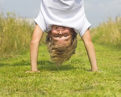 Young boy handstanding on jetty - Free Stock Photo by Jack Moreh on ...