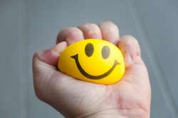 squeezing stress ball