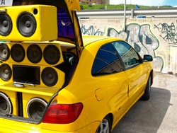 Tuned car with extreme speakers and sub woofers