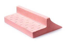 Pink plaster ramp with two sides for fingerboarding, isolated on a white background