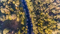 aerial view of small fishing boats in a row on a river canal, Killarney national park, Ireland