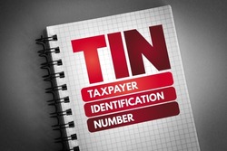 TIN - Taxpayer Identification Number is an identification number used by the Internal Revenue Service in the administration of tax laws, acronym text concept on notepad