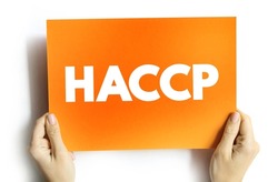 HACCP Hazard analysis and critical control points - systematic preventive approach to food safety from biological, chemical, and physical hazards in production processes, text concept on card