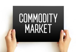 Commodity market is a market that trades in the primary economic sector rather than manufactured products, text concept on card