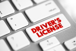 Driver's license - legal authorization confirming authorization to operate one or more types of motorized vehicles, text concept button on keyboard