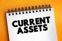 Current assets - assets of a company that are expected to be sold or used as a result of business operations over the next year, text concept on notepad