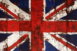 British flag on old wooden background.
