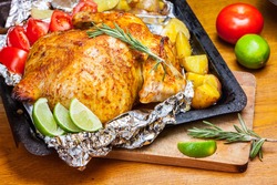 Roasted chicken on the foil 
