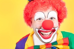 clown close on yellow background