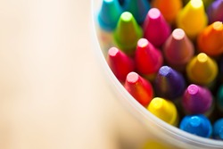Crayons shot form above with. Shallow depth of field for dreamy impressional feel .