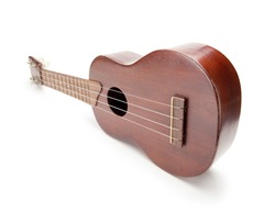 Vintage ukulele isolated on white.