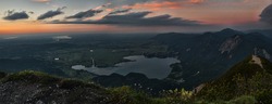 scenic view to alpine foothills and lake kochelsee at sundown, upper bavaria