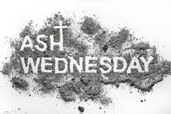 Ash wednesday word written in ash and christian cross symbol as a religion concept
