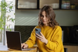 Girl working at home with a MacBook Pro  during quarantine