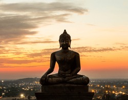 Buddha statue in sunset at  Phrabuddhachay Temple Saraburi, Thailand.