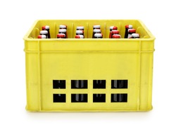 Crate with beer bottles isolated on white, contains clipping path