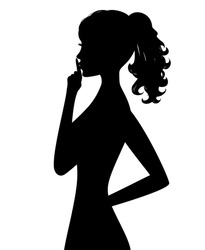 Silhouette of woman holding finger on her lips