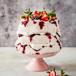 Three Layer Pavlova Cake with Whipped Cream, Raspberry Jam and Assorted Fruit and Berries, square