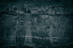 Old weathered concrete wall with hardened cement drips. Gloomy dark grunge background