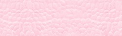 Pink painted shabby stone wall wide texture. Soft rose color stonework masonry. Light abstract wallpaper. Panoramic pastel vintage background
