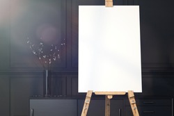 Realistic easel and blank white canvas with christmas decoration. 3d rendering.