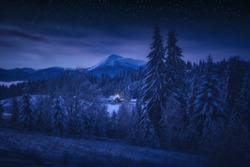 Beautiful starry night landscape of Ukrainian Carpathians. Frozen winter in a highlands, Europe travel, beauty world, Happy New Year, Marry Christmas.