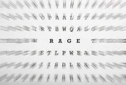 Word Rage in a puzzle or cross word riddle letter grid, focus motion blur effect to emphasize center