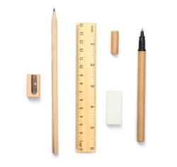 Set of wooden writing tools, pencil, pen, ruler, eraser and sharpener, isolated on white background