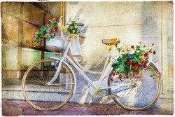 charming street  with old bike and flowers, artistic vintage picture