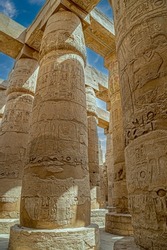 Aspects from the Karnak Temple complex, a mix of ancient egyptian temples and pylons near Luxor, Egypt. Construction began around 2000–1700 BCE up to 305–30 BCE. God is Amun-Ra. World Heritage Site.