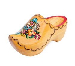 Dutch yellow wooden shoes over white background