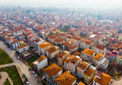 View from drone of residential districts of Turkish city of Balikesir in hazy winter day, Marmara Region.