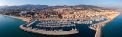 Aerial panoramic view of coastal El Masnou city, Catalonia, Spain