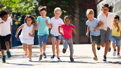 Activity children compete in the city street. High quality photo