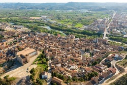 Aerial townscape of Fraga with view of Cinca River. Comarca of Bajo Cinca, province of Huesca, Aragon, Spain.