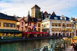 Scenic cityscape of old town of Annecy, southeastern France.Medieval city of Annecy with Thiou canal at sunny winter day, Haute Savoie department in Auvergne Rhone Alpes region, France