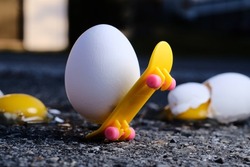 Egg riding skateboard as metaphor for learning from making mistakes