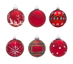 Group of isolated red christmas baubles with different decorations