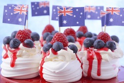 Australian mini pavlovas and flags in red, white and blue for Australia Day or national holiday party food treats. 