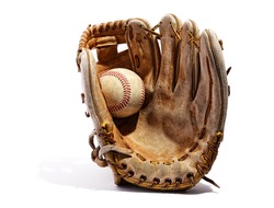 Old vintage leather baseball glove with the baseball held in the palm by the thumb standing upright on a white background