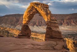 Sunrise view of Delicate Arch at Utah's Arches National Park. No people in the photo, classic view of the park