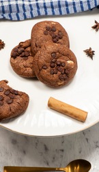 Freshly baked delectable triple choc cookies with white and milk chocolate.