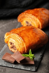 Delectable golden brown baked Pain au chocolat. 
